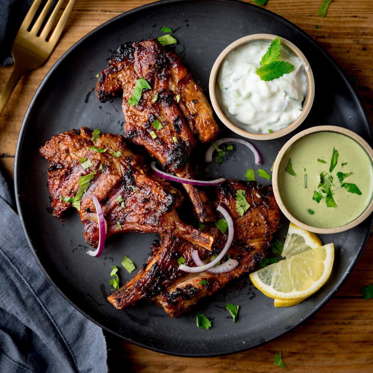 Charcoal-grilled meats with mint and yoghurt dips at Imperial Kitchen, restaurant in Trivandrum